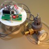 Photocell-controlled CO2 release