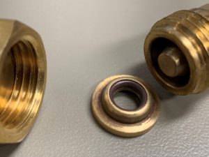 The brass no-drip seal located immediately behind the nozzle (left) and at the end of the 12-in. wand (right).  